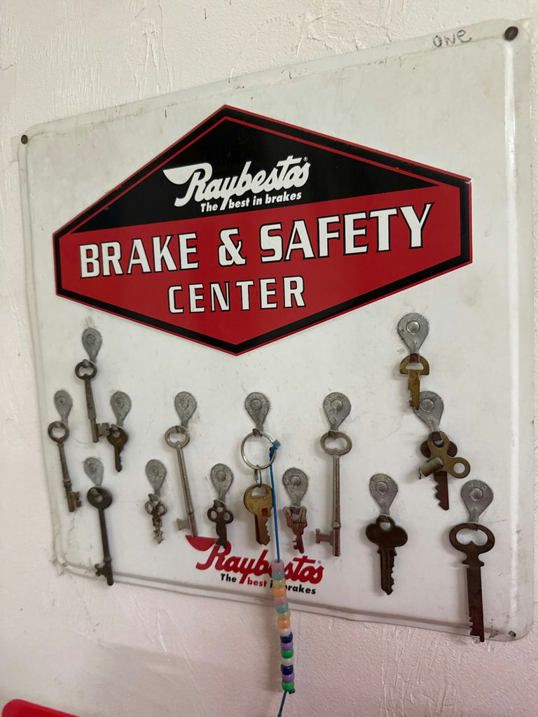 Vintage automotive signs, keys, and frame saw - image 3 of 3