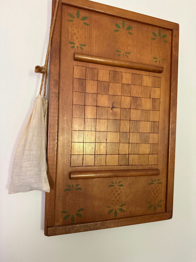 Wooden checkerboard wall plaque with grid board and hanging pouch - image 1 of 2