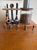 Pipes, tobacco jar, lighter, and small brass figurines - thumbnail 1 of 2