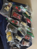 Assorted die-cast toy cars in bags - thumbnail 1 of 4