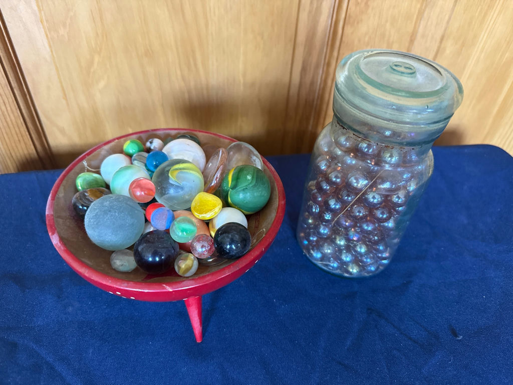 Assorted marbles in a red pedestal dish and glass jar - image 2 of 2