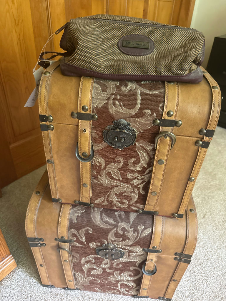 Stacked vintage luggage trunks with top bag - image 1 of 3