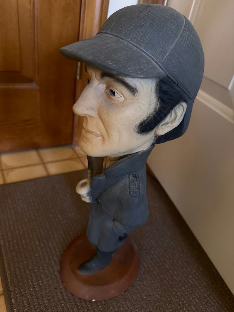 Sherlock Holmes figurine of a man in a suit with hat - image 2 of 2