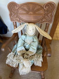 Wooden rocking chair with a plush bunny doll - thumbnail 1 of 3
