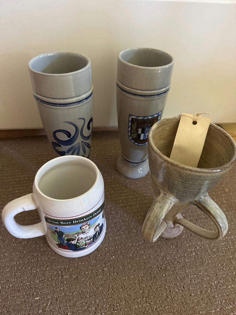 Two ceramic beer steins, a novelty mug, and a ceramic pour-over dripper - image 2 of 7