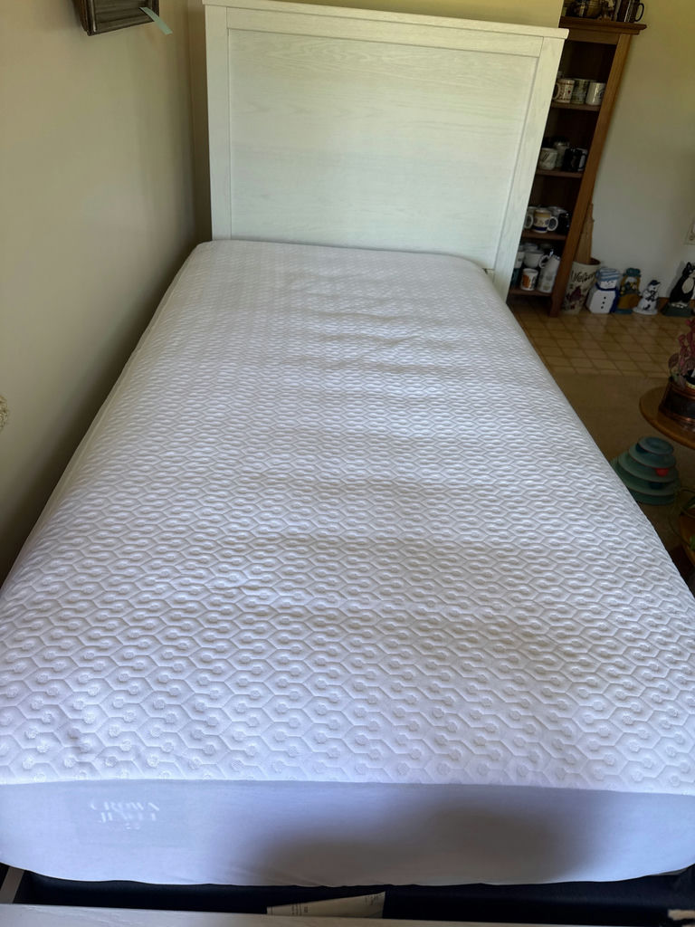 Twin size White wooden bed with mattress and gray tufted topper - image 1 of 6