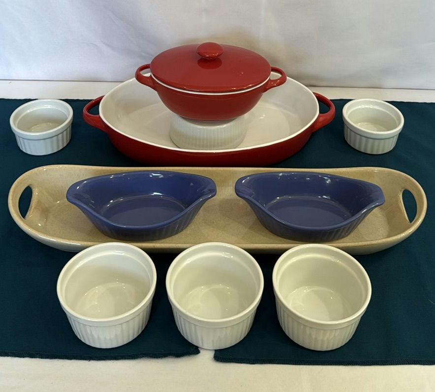 Red enamel Dutch oven with lid, blue oval bowls, beige rectangular tray, and white ramekins - image 1 of 9