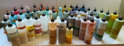 Assorted liquid paints and colorants in squeeze bottles - Image 1 of 11