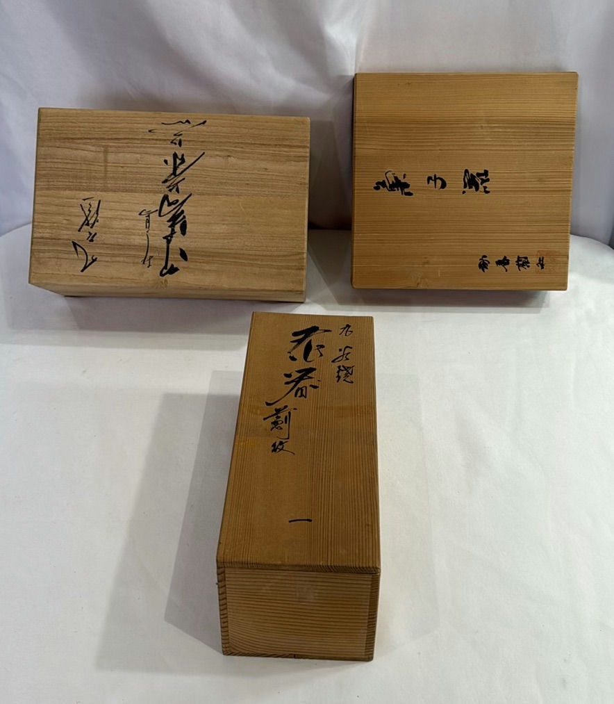 Three wooden boxes with calligraphy lids - image 1 of 4