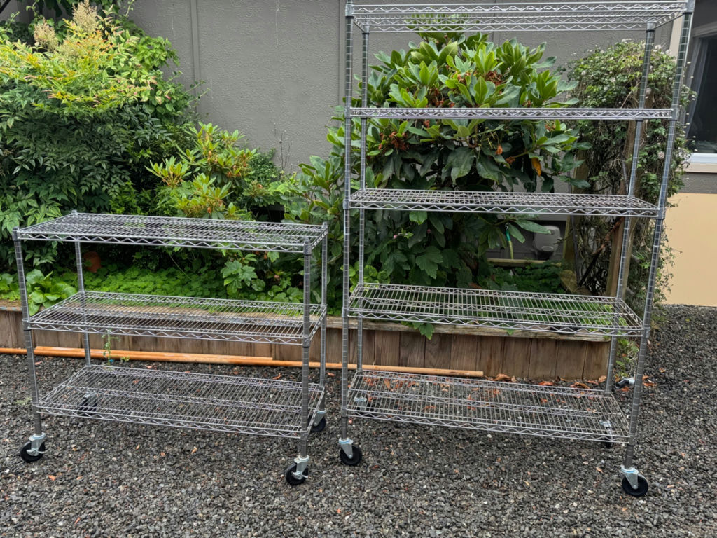 Two Stainless Steel rolling racks - image 1 of 3