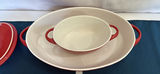 Red enamel Dutch oven with lid, blue oval bowls, beige rectangular tray, and white ramekins - thumbnail 3 of 9