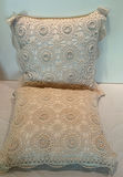 Decorative pillows with crocheted lace covers and red throw blanket - thumbnail 2 of 5