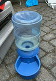 Pet supplies: dog crate, life jacket, water dispenser, and tent bed - thumbnail 4 of 9