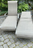 Pair of Sunbrella sling outdoor lounge chairs - thumbnail 1 of 3