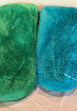 Two fluffy green and teal plush body pillows - thumbnail 1 of 3