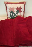 Decorative pillows with crocheted lace covers and red throw blanket - thumbnail 4 of 5