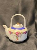 Miniature Porcelain teapot - thumbnail 1 of 7