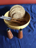Wooden bowl with cork coasters, ceramic cone-shaped vessels, and wooden-handled cutlery - thumbnail 1 of 2