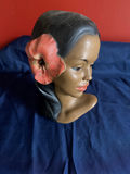 Hibiscus-ornamented female bust sculpture - thumbnail 1 of 4