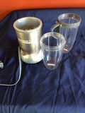 NutriBullet blender with cups and lids - thumbnail 1 of 2