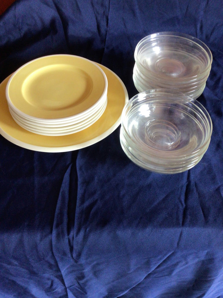 Yellow charger plate with white dinner plates and glass bowls - image 1 of 1