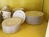 White porcelain dinnerware set with gold trim - thumbnail 4 of 5