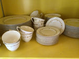 White porcelain dinnerware set with gold trim - thumbnail 1 of 5