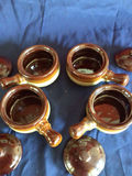 Four ceramic pots with lids - thumbnail 1 of 2