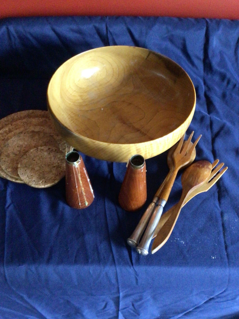Wooden bowl with cork coasters, ceramic cone-shaped vessels, and wooden-handled cutlery - image 2 of 2