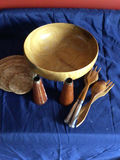 Wooden bowl with cork coasters, ceramic cone-shaped vessels, and wooden-handled cutlery - thumbnail 2 of 2