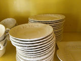 White ceramic teacups with saucers and plates - thumbnail 3 of 4