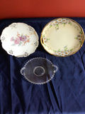 Floral porcelain plates and a beaded-edge glass serving dish - thumbnail 1 of 5
