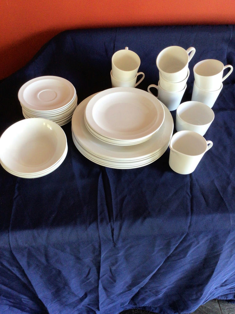 White ceramic dinnerware set with plates, bowls, and mugs - image 1 of 3