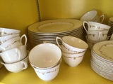 White porcelain dinnerware set with gold trim - thumbnail 2 of 5