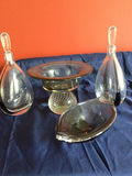 Two teardrop glass vases, a pedestal bowl, and a curved glass dish - thumbnail 2 of 2