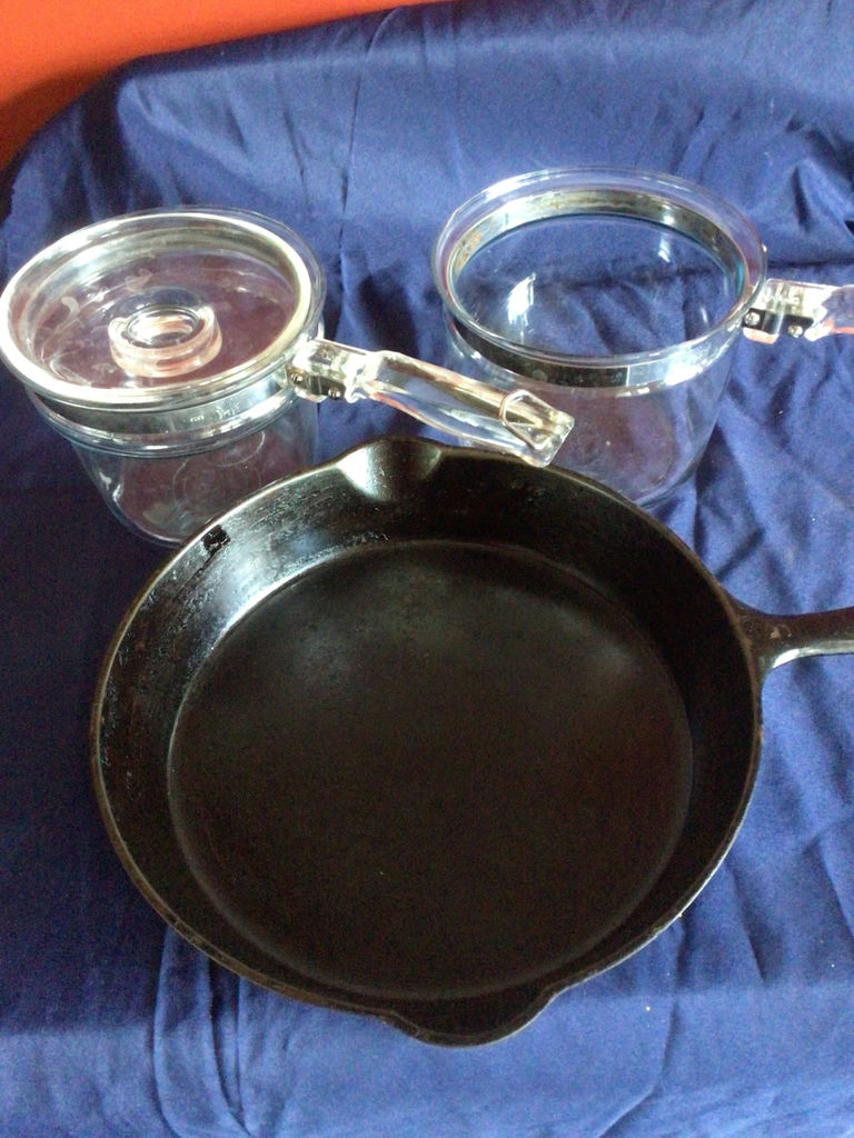 Griswold Cast iron skillet with two vintage Pyrex Flameware glass cookware pots - image 1 of 5