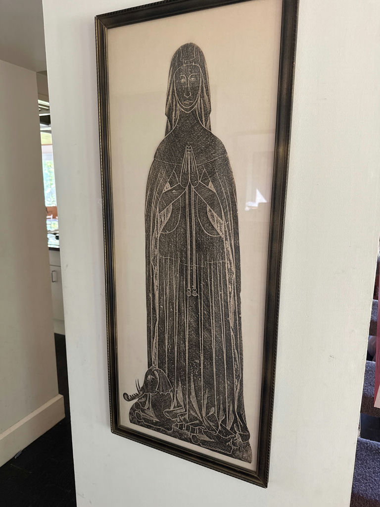 Framed vertical print of a robed praying figure - image 1 of 4