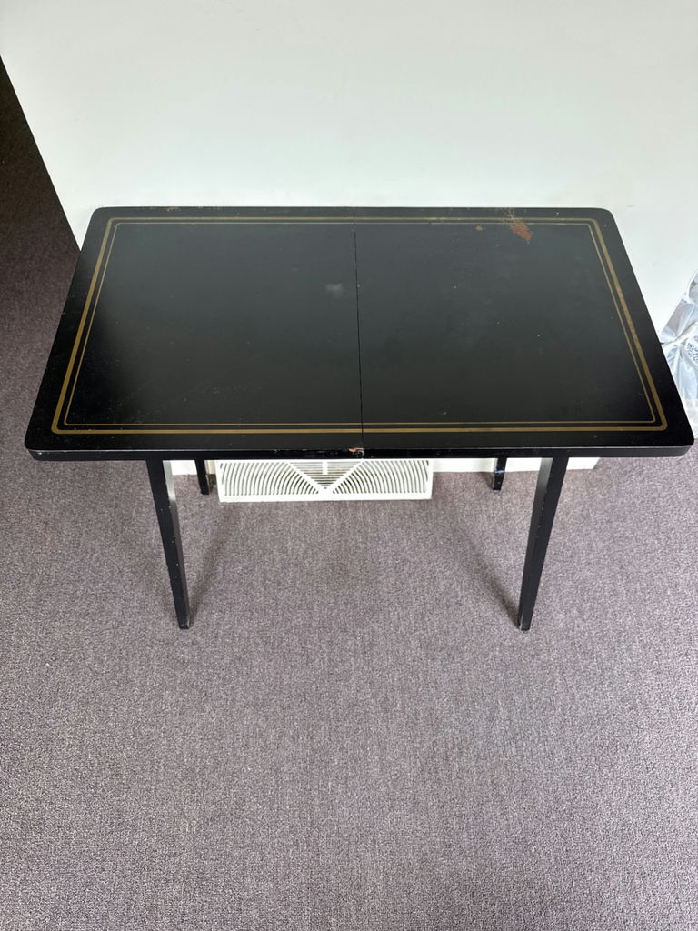 Two-leaf black lacquered folding table with gold trim - image 1 of 3