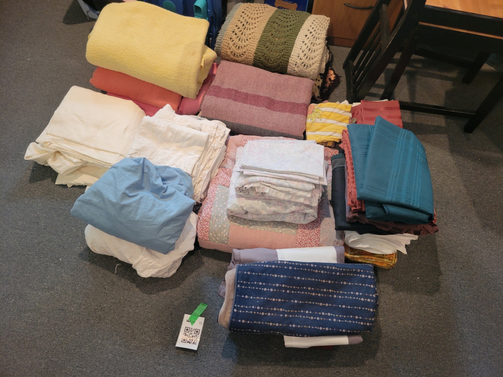 Collection of Folded Blankets and Linens - image 1 of 2