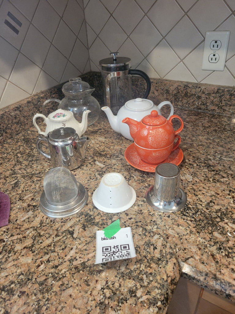 Collection of Teapots and Tea Strainers - image 1 of 1