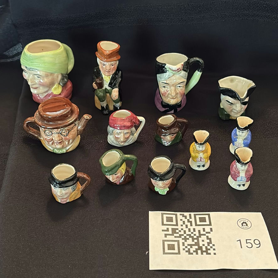 Collection of Character Toby Jugs and Miniature Mugs - image 1 of 17