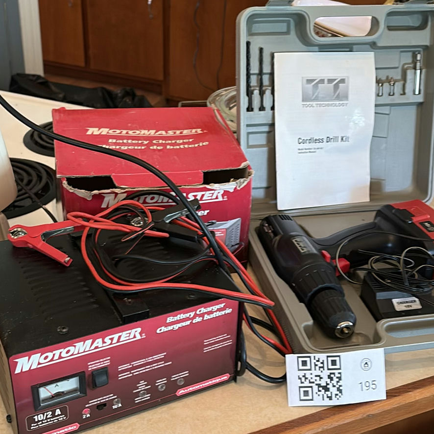 MotoMaster 10/2A Battery Charger and Cordless Drill Kit - image 1 of 10