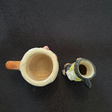 Collection of Character Ceramic Teapots, Toby Jugs, and Miniature Figurines - thumbnail 19 of 19