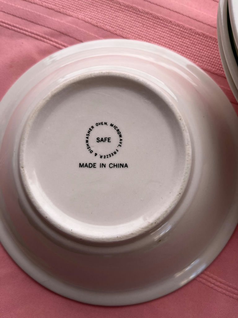 Floral ceramic serving bowl with green rim  - image 2 of 2