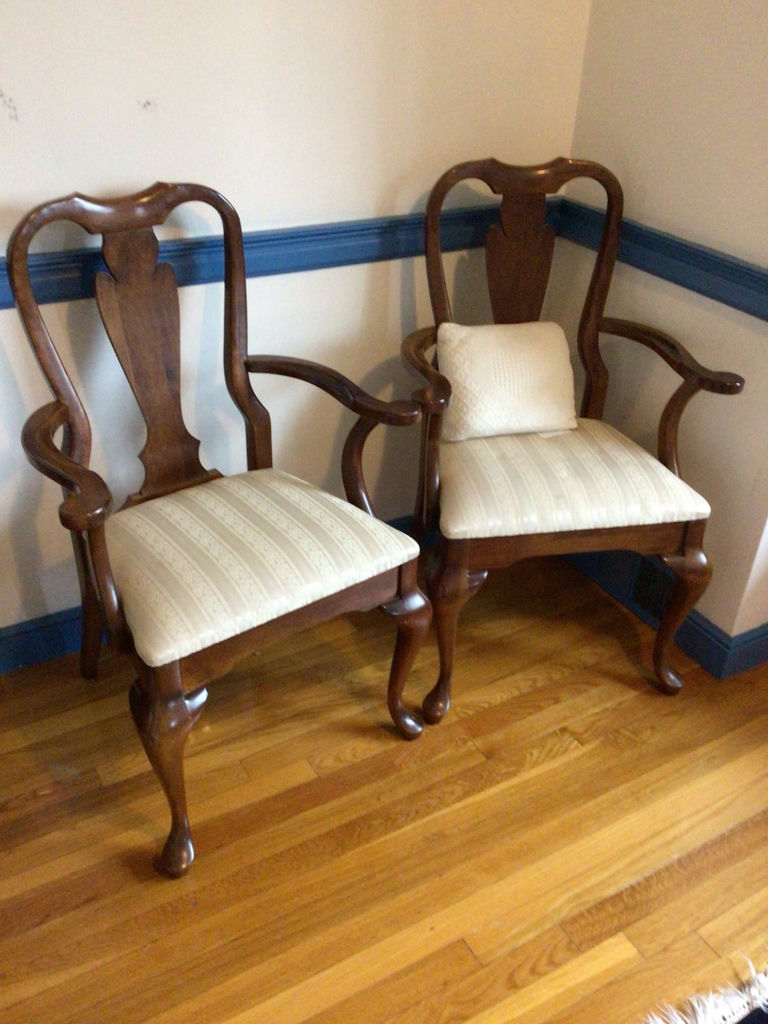 Pair of carved wooden armchairs with upholstered seats - image 1 of 2