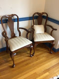 Pair of carved wooden armchairs with upholstered seats - thumbnail 1 of 2