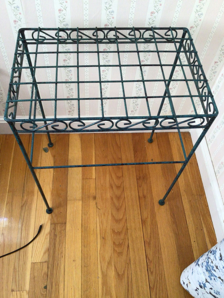 Wrought-iron grid-top four-legged stand - image 1 of 2