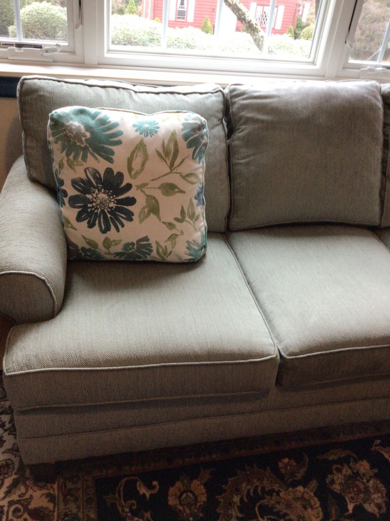 upholstered sofa with floral throw pillows - image 2 of 4