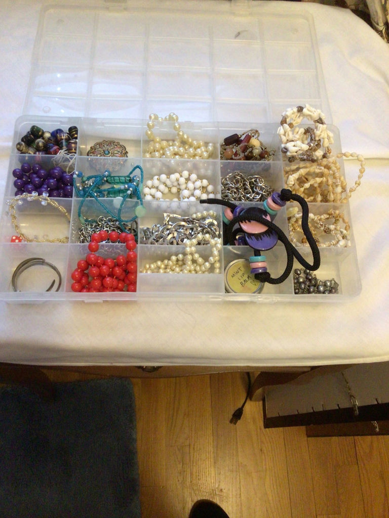 Assorted beads and jewelry in a compartment organizer - image 1 of 5