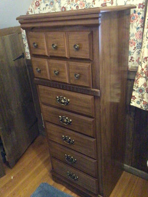 Tall wooden dresser with multiple drawers - Image 1 of 3